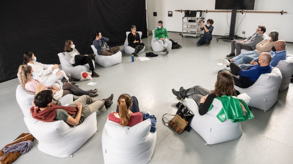 Participants in the Visiting Artist programme engage in discussions at Torinodanza Festival